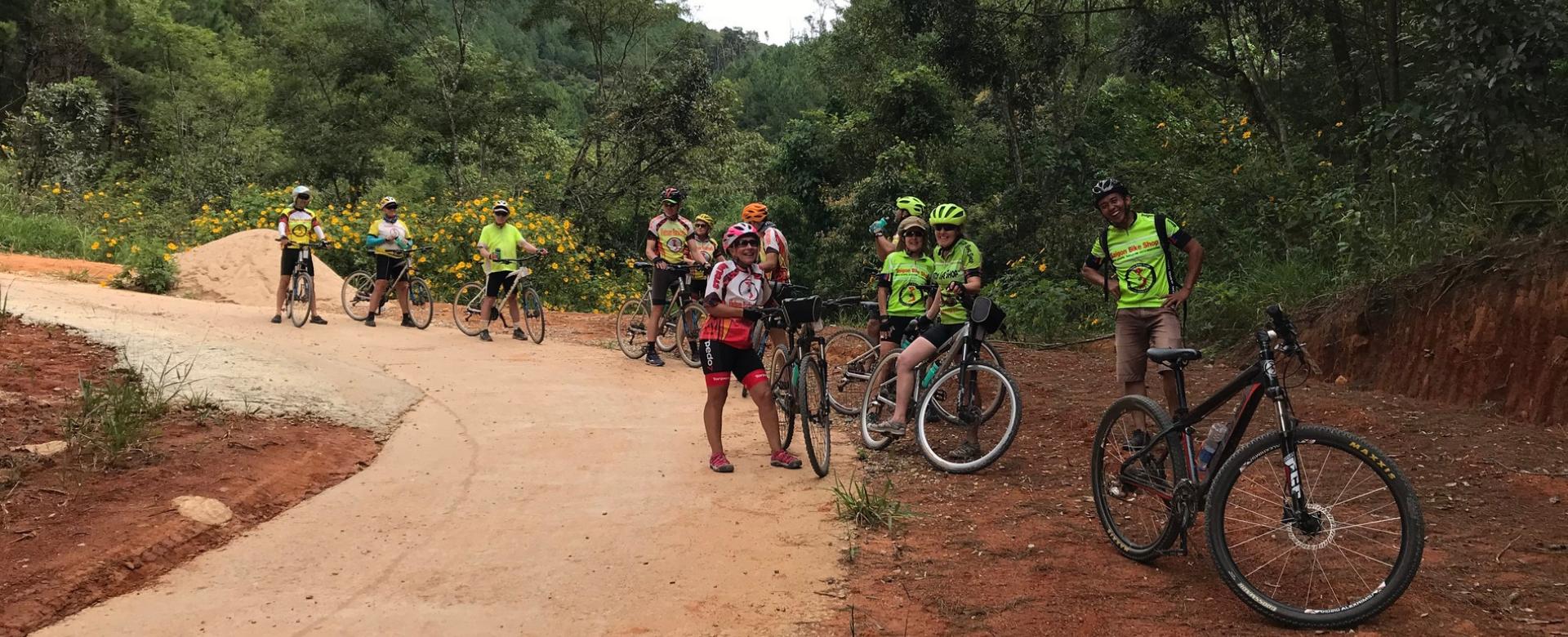 Cycling trails of Dalat, downhill ride to Ta Nung, visit local farms, waterfalls