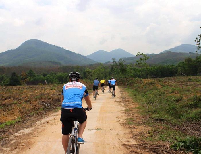 Cycling on Ho Chi Minh Trails, explore DMZ, ride on Hien Lien Bridge, visit Vinh Moc tunnels, ride to A Luoi