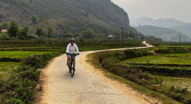 Cycling adventures Hanoi to Luang Prabang, see colorful tribes, enjoyn stunning scenery, biking Vietnam to Laos